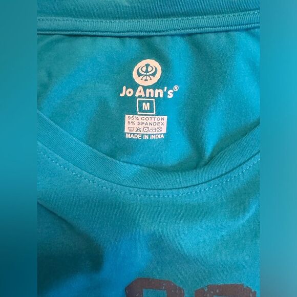 New! Never worn! Gorgeous blue Authentic Bahamas stretchy top! - Picture 7 of 7